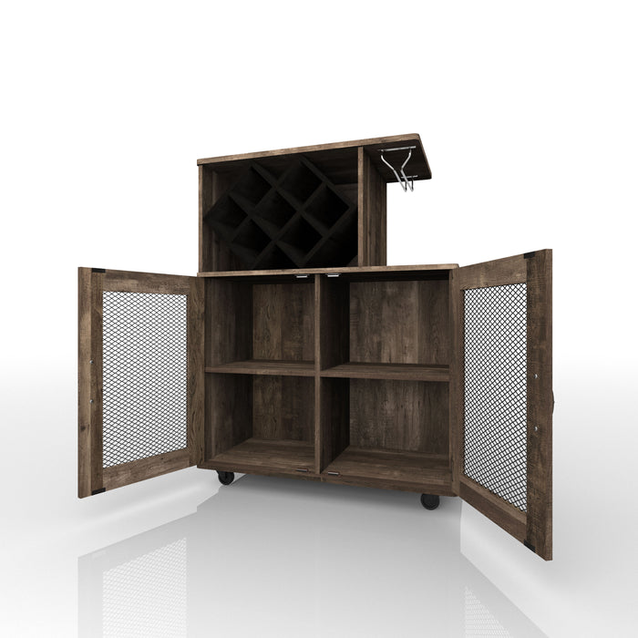 Left-angled reclaimed oak wine bar cabinet against a white background. The rustic mobile bar secures up to 7 bottles in a black lattice wine rack and wine glasses hang on the metal stemware rack. Wire mesh inserts adorn the double-door cabinet which open to reveal four shelves. The home bar sits on caster wheels for mobility.