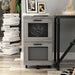 Front facing distressed gray mobile file cabinet in home office with accessories