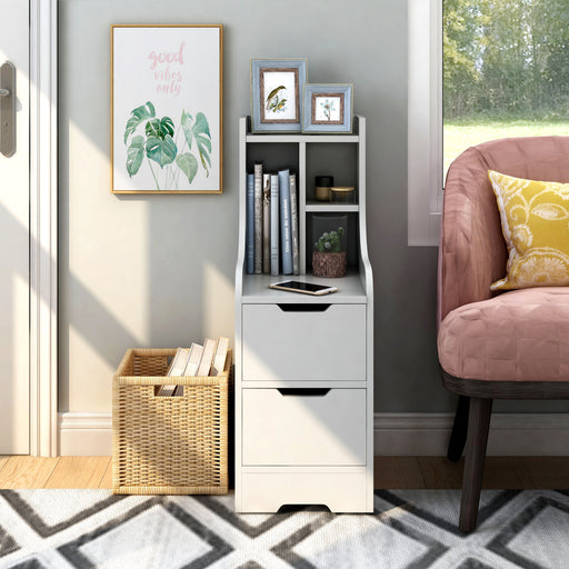Front-facing contemporary white two-drawer tall nightstand in a sitting area with accessories