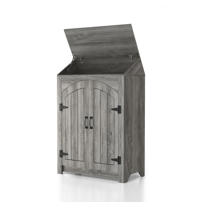 Left-facing transitional vintage gray oak shoe cabinet with opened lift top revealing extra storage over a white background. Arched plank style doors with rustic black pulls and hinges.