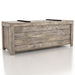 Right angled rustic weathered oak storage bench with a sliding top on a white background