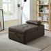Right angled transitional dark gray fabric convertible ottoman in a living room with accessories