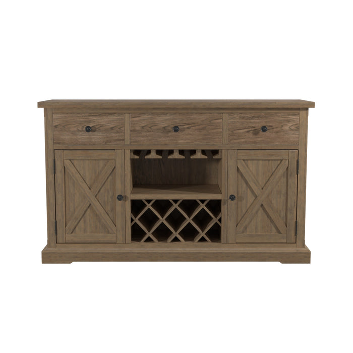 Front-facing light oak wine bar cabinet against a white background. The X-slatted cabinets flanking a trellis wine rack on a toe-kick base create a rustic farmhouse look. Three knobbed drawers perch just above the stemware rack.