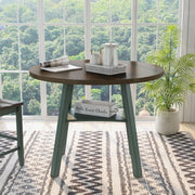 Front-facing rustic wood drop-leaf dining table with a wood finish top and colored base in a casual breakfast nook with accessories