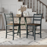 Antique grey ladderback counter height chair against a white background.