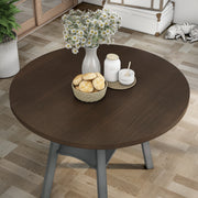 Top view rustic wood drop-leaf dining table with a wood finish top and colored base in a casual breakfast nook with accessories