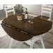 Top view rustic wood drop-leaf dining table with a wood finish top and white base with two chairs and leaves dropped down