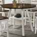 Right-angled rustic wood drop-leaf dining table with a wood finish top and white base with four chairs and wine accessories