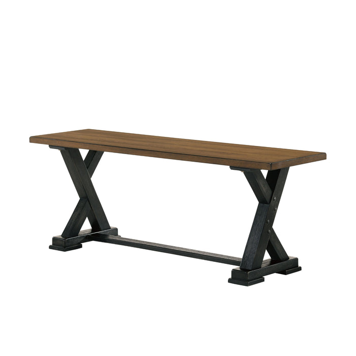 Left angled antique oak and black trestle bench on a white background