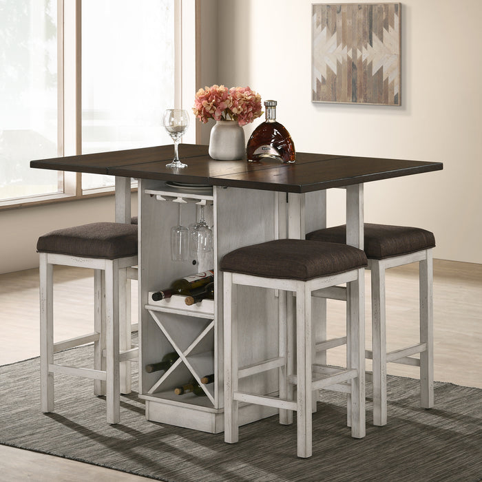 Left angled view of country dark walnut and antique white counter table with raised drop leaves and matching barstools in a dining room with stemware