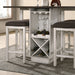 Left angled close-up detail view of wine bottle and stemware rack of country dark walnut and antique white counter table in a dining room with matching stools