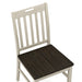 Top-down close-up view of rustic antique white slat back dining chair with dark oak seat on a white background 
