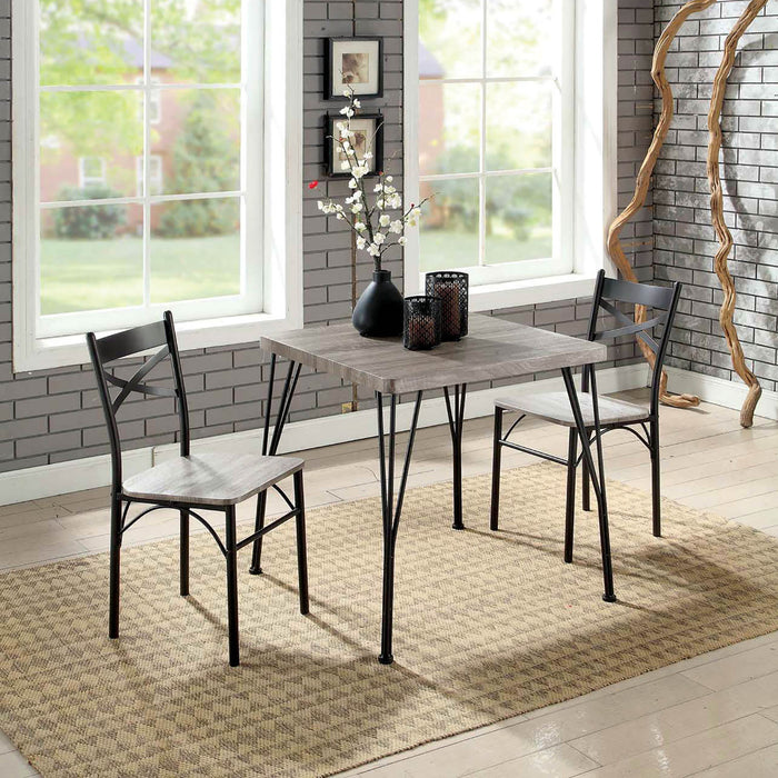 Right-angled three-piece casual bistro set with a square table and two chairs in a modern farmhouse breakfast nook with accessories