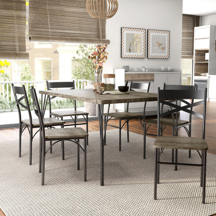 Angled left-facing seven-piece casual dining set with a rectangular wood grain table and six X-strap chairs in a casual dining room with accessories
