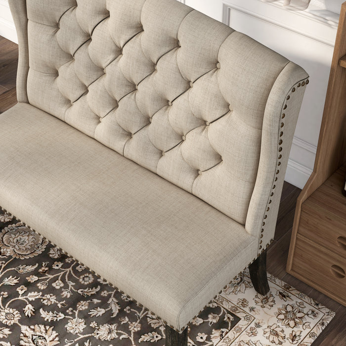 Left-angled top view of ambrosia transitional beige nailhead trim fabric loveseat dining bench in a living room with accessories