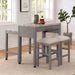 Right angled view of contemporary light gray nesting counter height table in a dining room with decor and matching stools