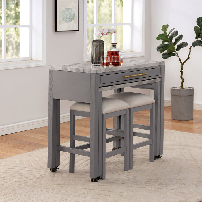 Right angled view of contemporary light gray nesting counter height table in a dining room with decor and matching stools