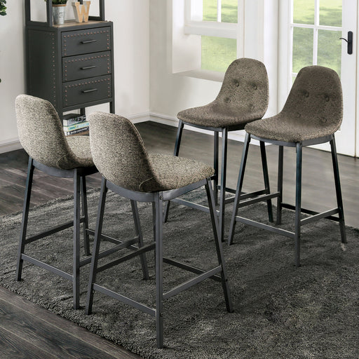 Left angled set of four mid-century modern counter height chairs with button tufting in a living area with accessories