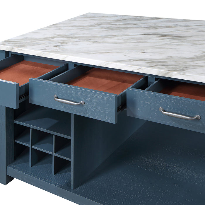 Close-up detail view of open drawers and white marble-like tabletop on a farmhouse blue counter height table on a white background