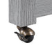 Close-up detail view of rolling metal caster wheels on extendable table of farmhouse light gray counter height table on a white background