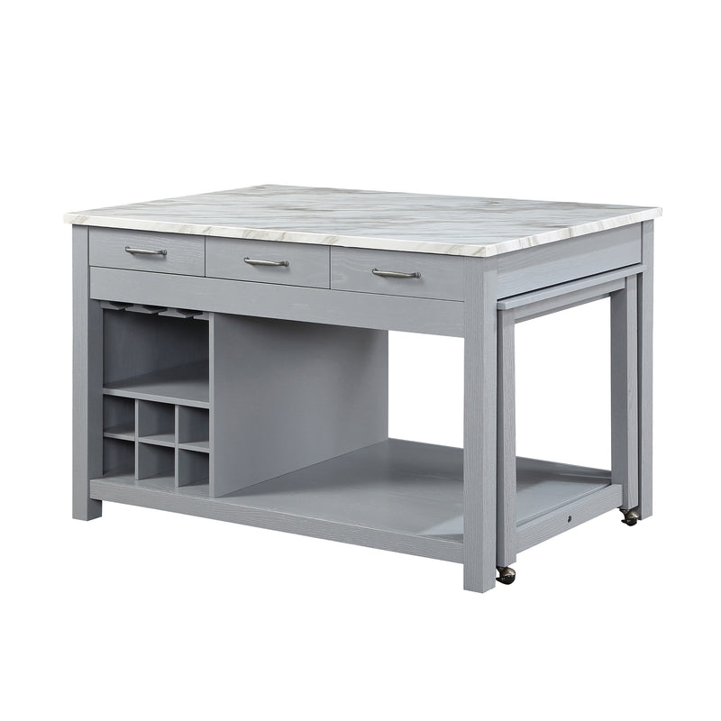 Left angled view of farmhouse light gray counter height table with white marble-like tabletop and open storage on a white background
