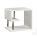 Right angled contemporary white geometric end table on a white background
