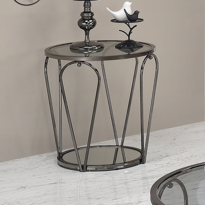 Right angled top-down modern round black nickel end table with open teardrop shape steel legs, a gray tempered glass top, and mirror open bottom shelf decorated against a wall.