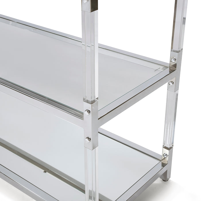 Left angled close-up view of glass shelves in acrylic and chrome steel frame with rivets on modern sofa table on a white background