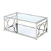 Left angled view of glam chrome steel coffee table with ring motifs and a mirrored bottom shelf on a white background