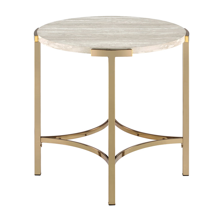 Front-facing view of modern glam round end table with white faux marble tabletop and champagne steel base on a white background