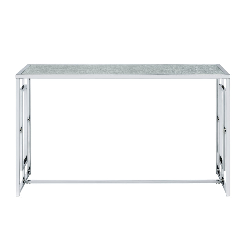 Front-facing view of modern chrome plated steel sofa table with geometric trestle base and waterfall pattern tempered glass top on a white background