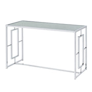 Left angled view of modern chrome plated steel sofa table with geometric trestle base and water rippled tempered glass top on a white background