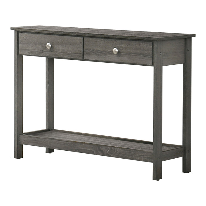 Left angled view of transitional gray console table with open bottom shelf and two drawers on a white background