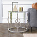 Front facing contemporary chrome and mirror end table in a living room with accessories