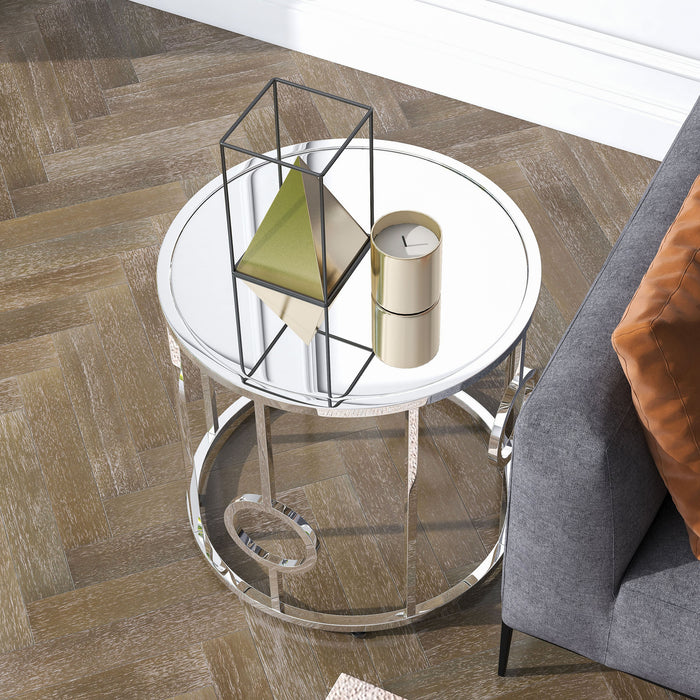 Front facing top view of a contemporary chrome and mirror end table in a living room with accessories
