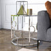 Front facing contemporary chrome and mirror end table in a living room with accessories