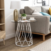 Front-facing contemporary white geometric end table with a octagon tempered glass top in living room with furnishings and accessories