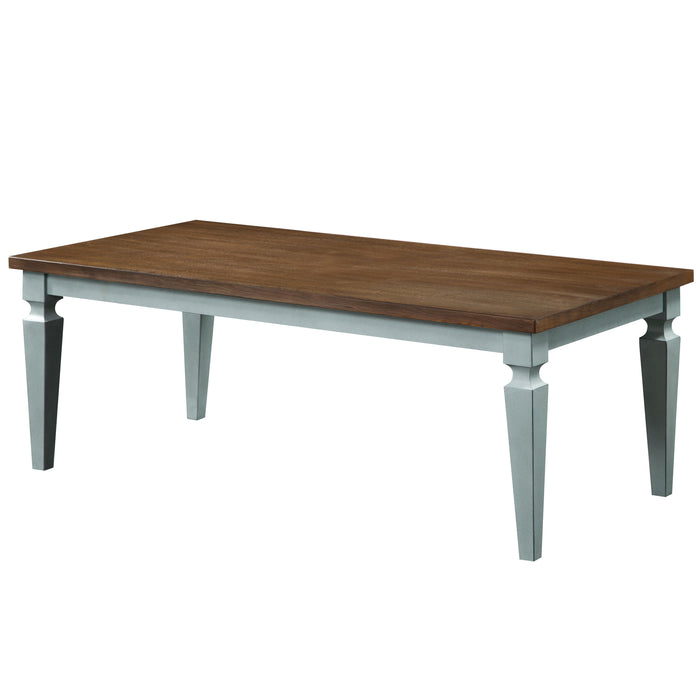 Semi-side facing view of transitional antique blue and oak finish wood coffee table on a white background