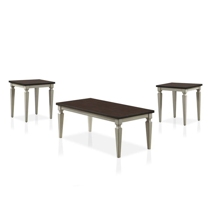 Semi-side facing view of transitional three-piece antique white and brown finish wood coffee table set on a white background