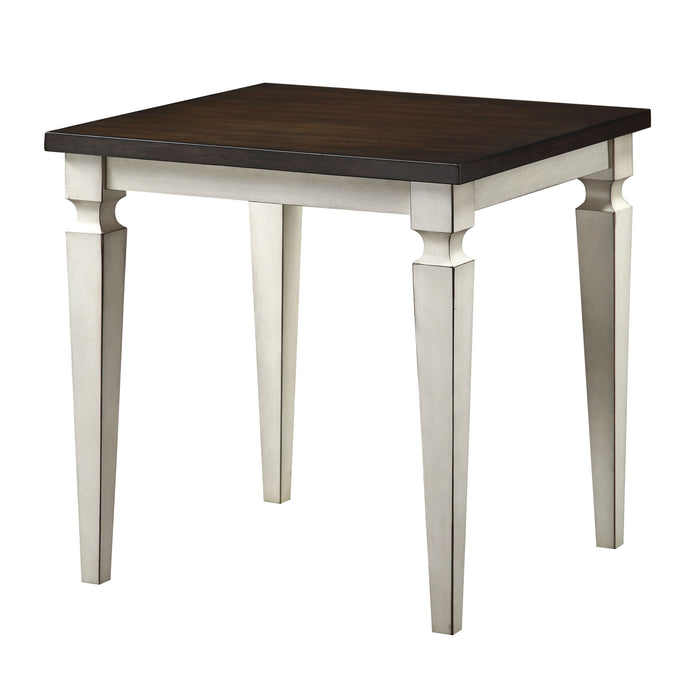 Semi-side facing view of transitional antique white and brown finish wood end table on a white background