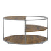 Front-facing view of contemporary round gray steel and wood three-level coffee table on a white background