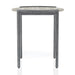 Side-facing view of contemporary light gray and gunmetal round end table on a white background.