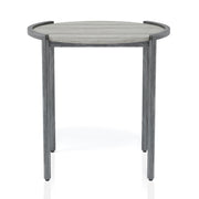 Front-facing view of contemporary light gray and gunmetal round end table on a white background.