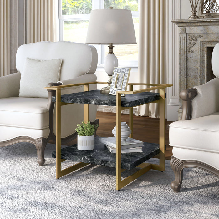 Left angled modern glam gold and faux marble square side table in a living room with accessories