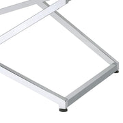 Left angled close up base detail of a glam chrome and white geometric coffee table on a white background