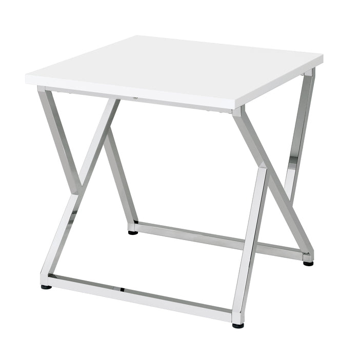 Left angled contemporary chrome and high gloss white end table on a white background