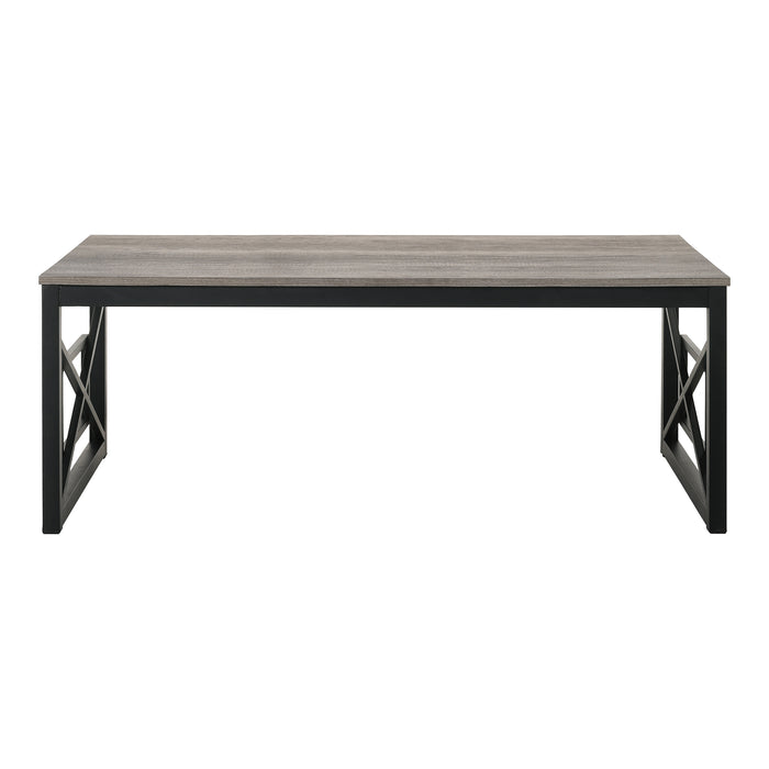Front-facing transitional gray rectangular coffee table with geometric black metal sled bases on a white background.