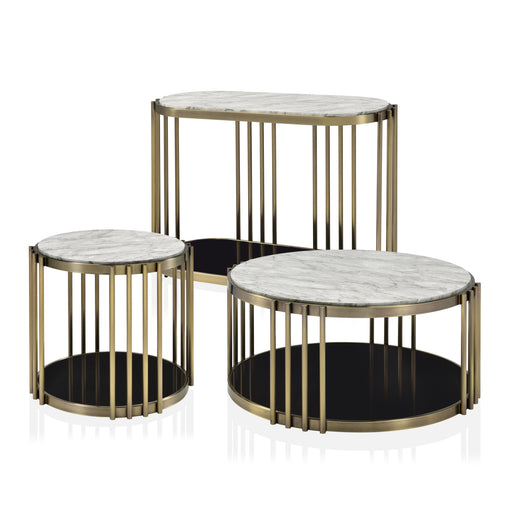 3-piece accent table set against a white background. Faux white marble tabletops and black glass base shelves sandwich an antique brass frames.