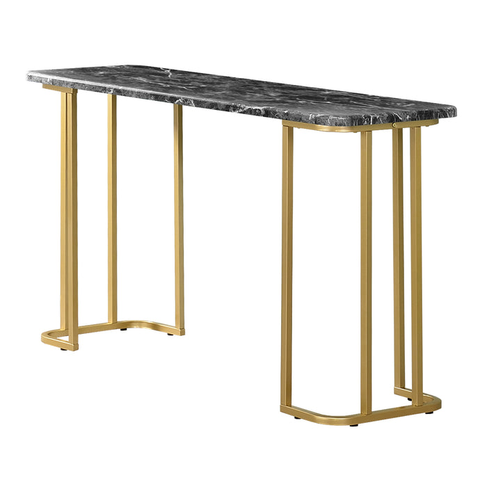 Angled view of contemporary black marble and gold coated steel geometric sofa table on a white background