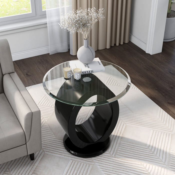 Angled view of contemporary geometric glossy black and tempered glass top end table in living room with accessories